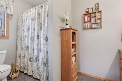 This custom-built, 5 BD/3 BA brick rambler is a rare find on Spring Valley Golf Course in Wisconsin - for sale on GolfHomes.com, golf home, golf lot