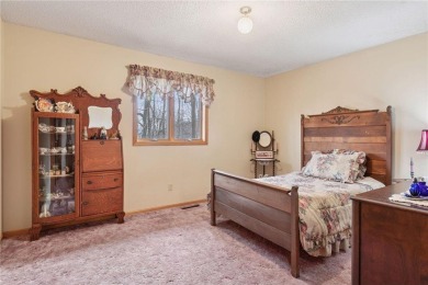This custom-built, 5 BD/3 BA brick rambler is a rare find on Spring Valley Golf Course in Wisconsin - for sale on GolfHomes.com, golf home, golf lot