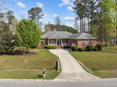 Welcome to this stunning home located in the amenity-rich on Cypress Landing Golf Club in North Carolina - for sale on GolfHomes.com, golf home, golf lot