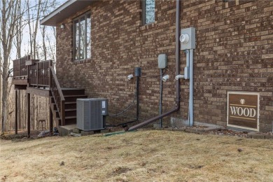 This custom-built, 5 BD/3 BA brick rambler is a rare find on Spring Valley Golf Course in Wisconsin - for sale on GolfHomes.com, golf home, golf lot