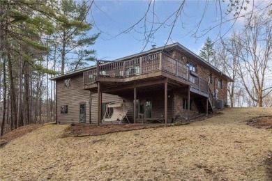 This custom-built, 5 BD/3 BA brick rambler is a rare find on Spring Valley Golf Course in Wisconsin - for sale on GolfHomes.com, golf home, golf lot