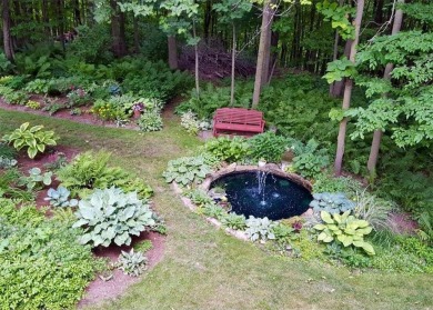 This custom-built, 5 BD/3 BA brick rambler is a rare find on Spring Valley Golf Course in Wisconsin - for sale on GolfHomes.com, golf home, golf lot