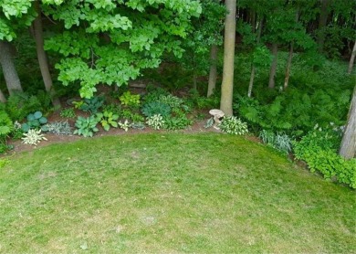 This custom-built, 5 BD/3 BA brick rambler is a rare find on Spring Valley Golf Course in Wisconsin - for sale on GolfHomes.com, golf home, golf lot