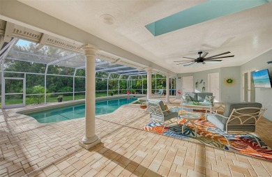 This expansive 3,396 sq. ft. residence is a sanctuary of luxury on River Wilderness Golf and Country Club in Florida - for sale on GolfHomes.com, golf home, golf lot