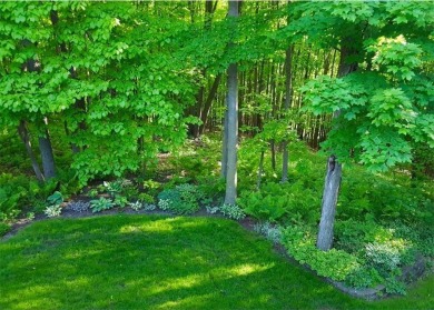This custom-built, 5 BD/3 BA brick rambler is a rare find on Spring Valley Golf Course in Wisconsin - for sale on GolfHomes.com, golf home, golf lot