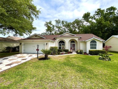 Beautiful home with a large Florida room overlooking a golf on Plantation Golf Club in Florida - for sale on GolfHomes.com, golf home, golf lot