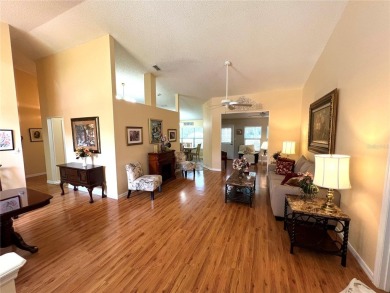 Beautiful home with a large Florida room overlooking a golf on Plantation Golf Club in Florida - for sale on GolfHomes.com, golf home, golf lot