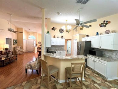 Beautiful home with a large Florida room overlooking a golf on Plantation Golf Club in Florida - for sale on GolfHomes.com, golf home, golf lot
