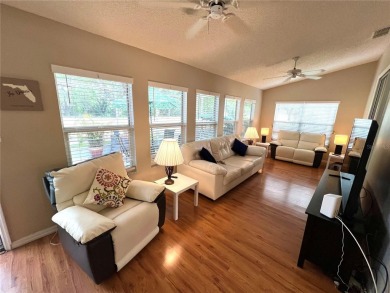 Beautiful home with a large Florida room overlooking a golf on Plantation Golf Club in Florida - for sale on GolfHomes.com, golf home, golf lot