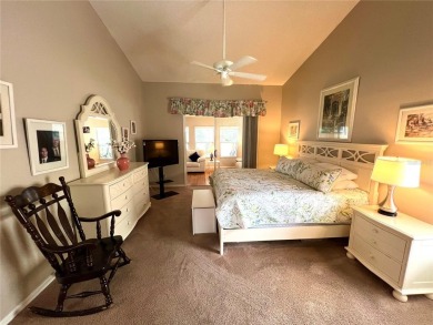 Beautiful home with a large Florida room overlooking a golf on Plantation Golf Club in Florida - for sale on GolfHomes.com, golf home, golf lot