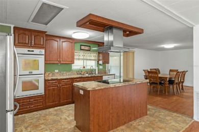 Some photos digitally staged.  Wow! Would you look at this price on Brookridge Country Club in Florida - for sale on GolfHomes.com, golf home, golf lot