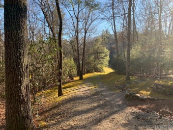 This 2.83 +/- acre estate-sized lot sits beautifully within the on Wade Hampton Golf Club in North Carolina - for sale on GolfHomes.com, golf home, golf lot