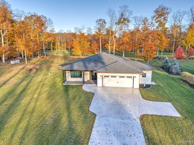 Experience refined modern living in this stunning 2025 on Indian Lake Golf and Country Club in Michigan - for sale on GolfHomes.com, golf home, golf lot