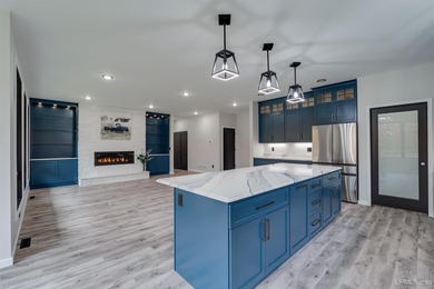 Experience refined modern living in this stunning 2025 on Indian Lake Golf and Country Club in Michigan - for sale on GolfHomes.com, golf home, golf lot