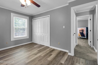 Beautiful 3-bedroom, 2-bathroom home tucked away on nearly an on Minnesott Golf and Country Club in North Carolina - for sale on GolfHomes.com, golf home, golf lot