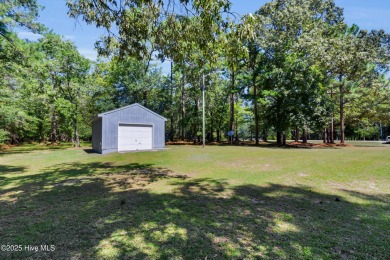 Beautiful 3-bedroom, 2-bathroom home tucked away on nearly an on Minnesott Golf and Country Club in North Carolina - for sale on GolfHomes.com, golf home, golf lot