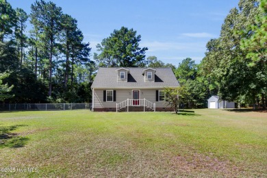 Beautiful 3-bedroom, 2-bathroom home tucked away on nearly an on Minnesott Golf and Country Club in North Carolina - for sale on GolfHomes.com, golf home, golf lot