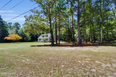 Beautiful 3-bedroom, 2-bathroom home tucked away on nearly an on Minnesott Golf and Country Club in North Carolina - for sale on GolfHomes.com, golf home, golf lot