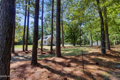 Beautiful 3-bedroom, 2-bathroom home tucked away on nearly an on Minnesott Golf and Country Club in North Carolina - for sale on GolfHomes.com, golf home, golf lot