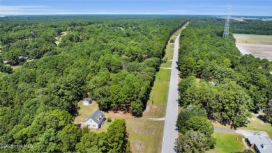 Beautiful 3-bedroom, 2-bathroom home tucked away on nearly an on Minnesott Golf and Country Club in North Carolina - for sale on GolfHomes.com, golf home, golf lot