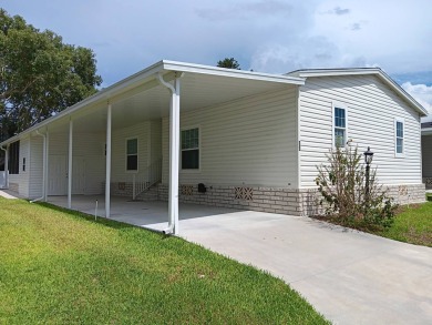 This 1,848 some sqft home was built in 2022 and it shows! Modern on Cypresswood Golf and Country Club in Florida - for sale on GolfHomes.com, golf home, golf lot