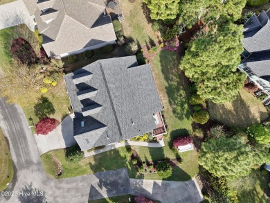 Enjoy living in this updated, custom built, classic low country on Members Club At St. James Plantation in North Carolina - for sale on GolfHomes.com, golf home, golf lot