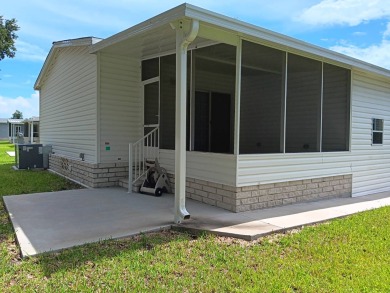 This 1,848 some sqft home was built in 2022 and it shows! Modern on Cypresswood Golf and Country Club in Florida - for sale on GolfHomes.com, golf home, golf lot