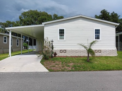 This 1,848 some sqft home was built in 2022 and it shows! Modern on Cypresswood Golf and Country Club in Florida - for sale on GolfHomes.com, golf home, golf lot