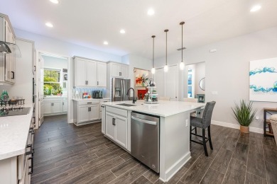 Under contract-accepting backup offers. Built in 2021 and better on Eagle Creek Golf Club in Florida - for sale on GolfHomes.com, golf home, golf lot
