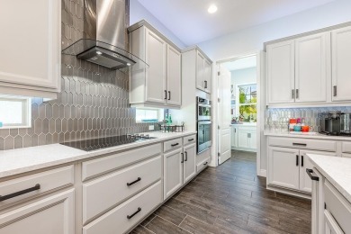 Under contract-accepting backup offers. Built in 2021 and better on Eagle Creek Golf Club in Florida - for sale on GolfHomes.com, golf home, golf lot