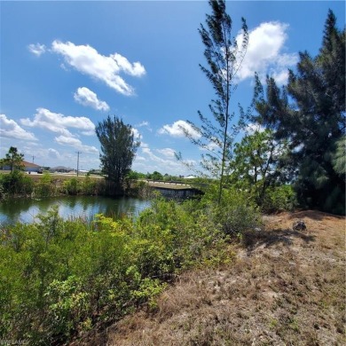 VACANT WATERFRONT CORNER LOT.  Buy and Build or Hold for on Burnt Store Golf Club in Florida - for sale on GolfHomes.com, golf home, golf lot