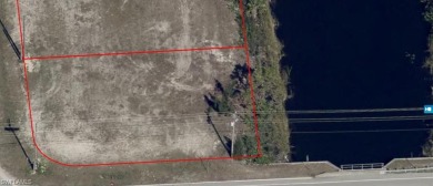 VACANT WATERFRONT CORNER LOT.  Buy and Build or Hold for on Burnt Store Golf Club in Florida - for sale on GolfHomes.com, golf home, golf lot