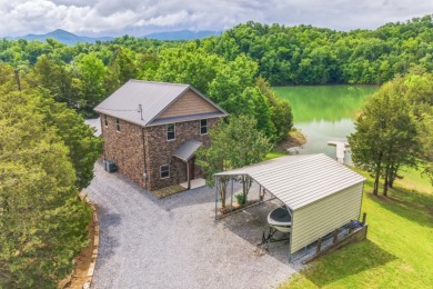 Outstanding Douglas Lake Front Home for sale on GolfHomes.com