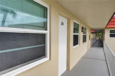 Enjoy carefree Florida living in this clean 1BR/1BA 2nd-floor on The American Golf Club in Florida - for sale on GolfHomes.com, golf home, golf lot