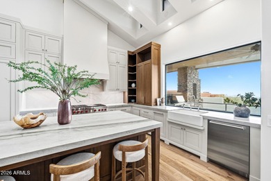 Framed by sweeping views of Pinnacle Peak and city lights, this on Desert Mountain Golf Club - Renegade Course in Arizona - for sale on GolfHomes.com, golf home, golf lot