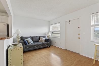 Enjoy carefree Florida living in this clean 1BR/1BA 2nd-floor on The American Golf Club in Florida - for sale on GolfHomes.com, golf home, golf lot