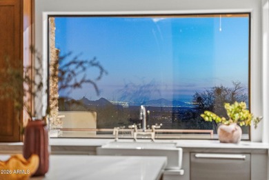 Framed by sweeping views of Pinnacle Peak and city lights, this on Desert Mountain Golf Club - Renegade Course in Arizona - for sale on GolfHomes.com, golf home, golf lot