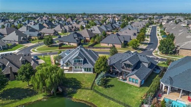 Breathtaking luxury residence nestled in one of Edmond's premier on Rose Creek Golf Club in Oklahoma - for sale on GolfHomes.com, golf home, golf lot