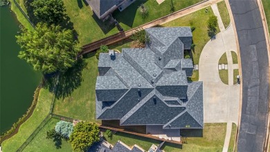 Breathtaking luxury residence nestled in one of Edmond's premier on Rose Creek Golf Club in Oklahoma - for sale on GolfHomes.com, golf home, golf lot