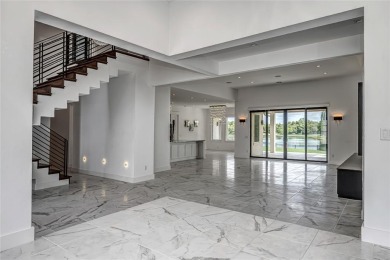 Breathtaking luxury residence nestled in one of Edmond's premier on Rose Creek Golf Club in Oklahoma - for sale on GolfHomes.com, golf home, golf lot