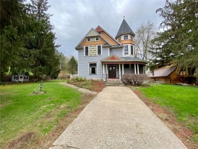 This beautiful Victorian home in Lanesboro is detailed with on Lanesboro Golf Club in Minnesota - for sale on GolfHomes.com, golf home, golf lot