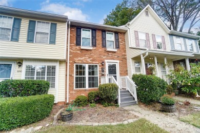 This beautifully updated brick-front townhome in the desirable on Raintree Country Club in North Carolina - for sale on GolfHomes.com, golf home, golf lot