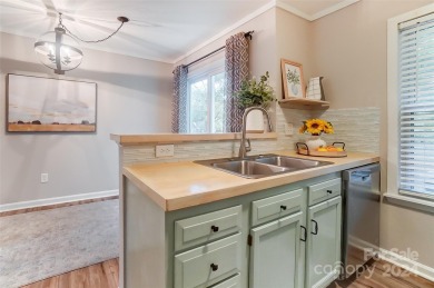 This beautifully updated brick-front townhome in the desirable on Raintree Country Club in North Carolina - for sale on GolfHomes.com, golf home, golf lot