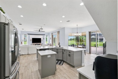 Exquisite Golf Course Living at 13049 Thoroughbred Drive, Dade on Lake Jovita Golf and Country Club in Florida - for sale on GolfHomes.com, golf home, golf lot