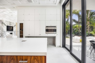 Stunning architecturally significant custom home for sale on on Miami Beach Golf Club in Florida - for sale on GolfHomes.com, golf home, golf lot