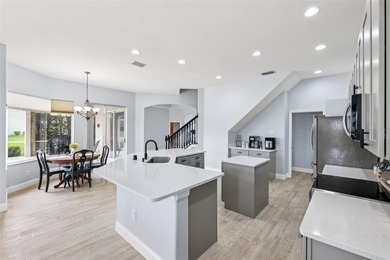 Exquisite Golf Course Living at 13049 Thoroughbred Drive, Dade on Lake Jovita Golf and Country Club in Florida - for sale on GolfHomes.com, golf home, golf lot