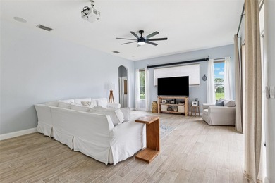 Exquisite Golf Course Living at 13049 Thoroughbred Drive, Dade on Lake Jovita Golf and Country Club in Florida - for sale on GolfHomes.com, golf home, golf lot