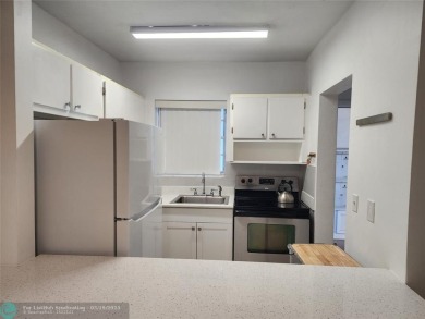 Updated 1st floor condo with golf course views on 5th green on Leisureville Community Association in Florida - for sale on GolfHomes.com, golf home, golf lot