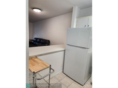 Updated 1st floor condo with golf course views on 5th green on Leisureville Community Association in Florida - for sale on GolfHomes.com, golf home, golf lot