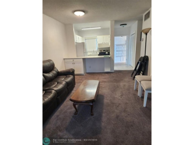 Updated 1st floor condo with golf course views on 5th green on Leisureville Community Association in Florida - for sale on GolfHomes.com, golf home, golf lot